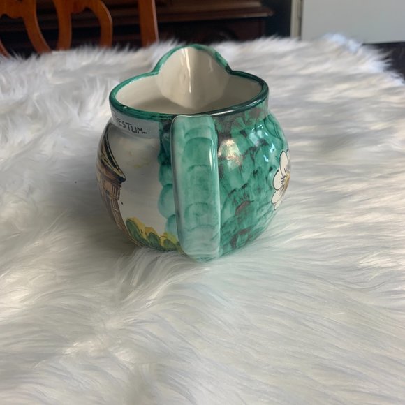 Hand Crafted Pottery Pitcher Green Yellow Floral Design and Structured Building - Picture 2 of 7